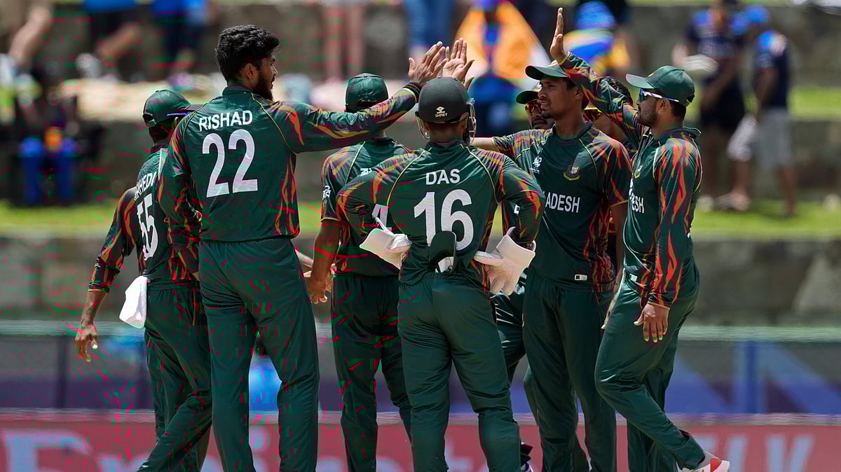 Bangladesh's Rishad Hossain, second left, celebrates with teammates after the dismissal of India's Rishabh Pant during the ICC Men's T20 World Cup cricket match between India and Bangladesh at Sir Vivian Richards Stadium in North Sound, Antigua and Barbuda, Saturday, June 22, 2024. 
 - (AP Photo/Lynne Sladky)